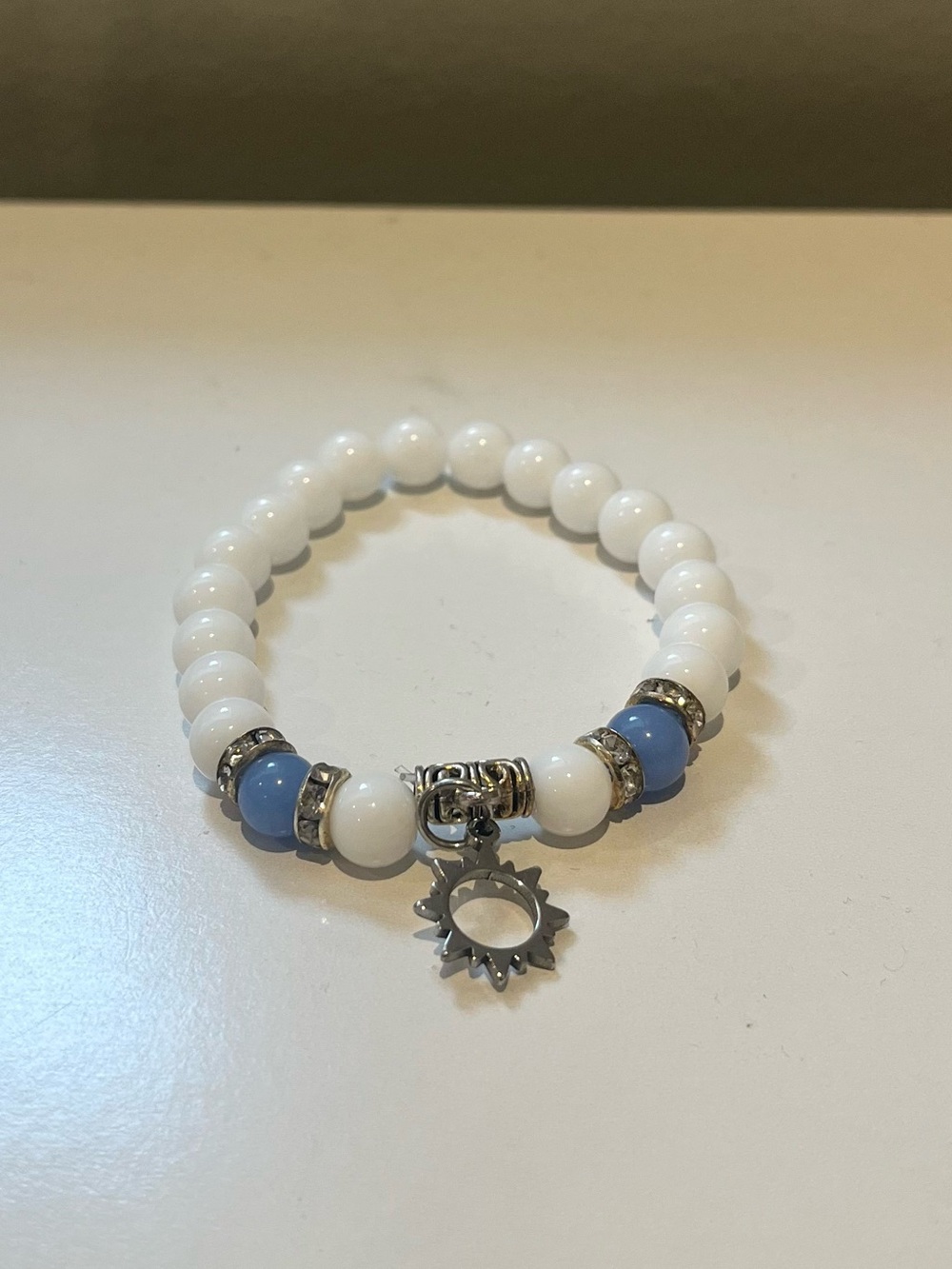 White and Light Blue Beaded Sun Charm Bracelet
